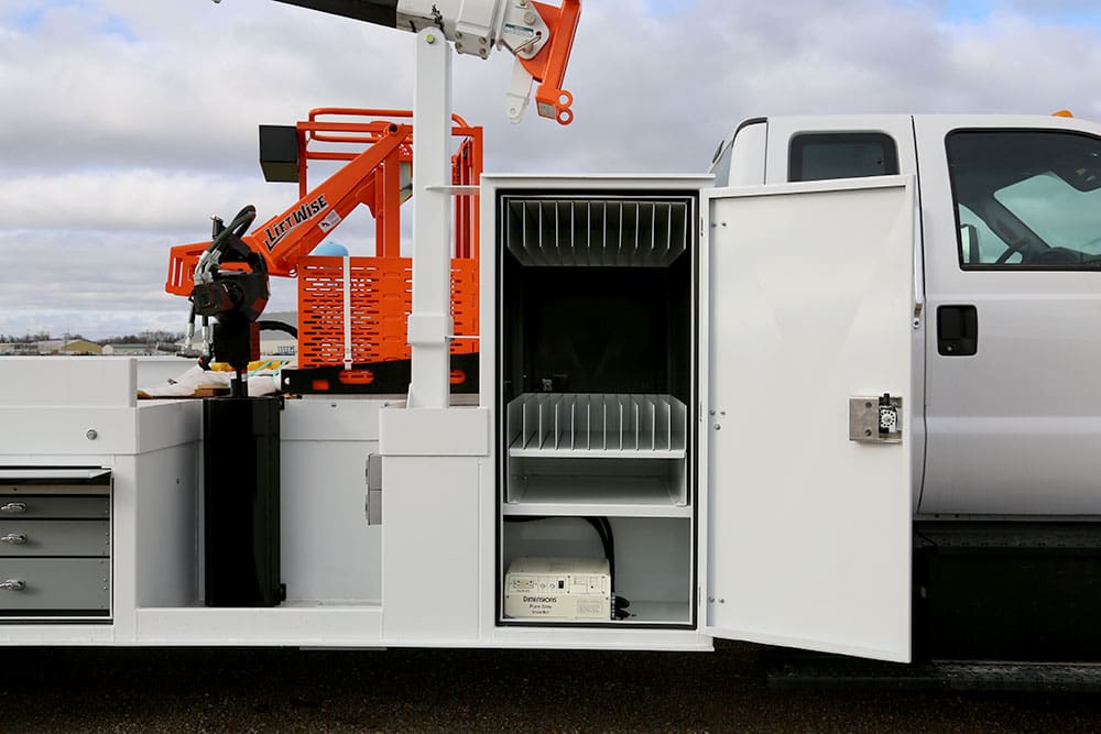 Close up on the right side of a 6000MH Specialty Crane with a storage door open