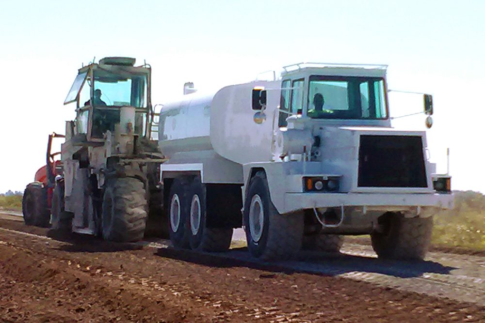 white fuel truck front side view