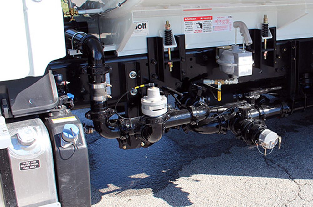 close up of water truck machinery
